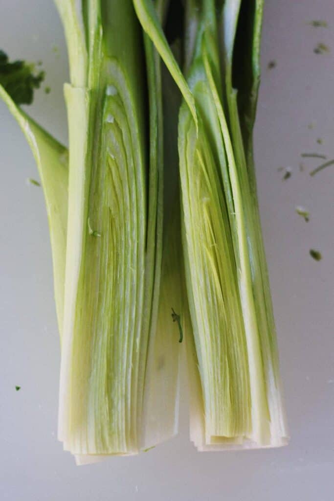 leeks split in half for roasted winter salad