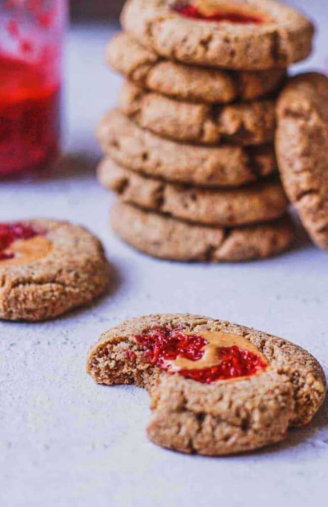image of keto peanut butter and jelly cookie with a stack behind it