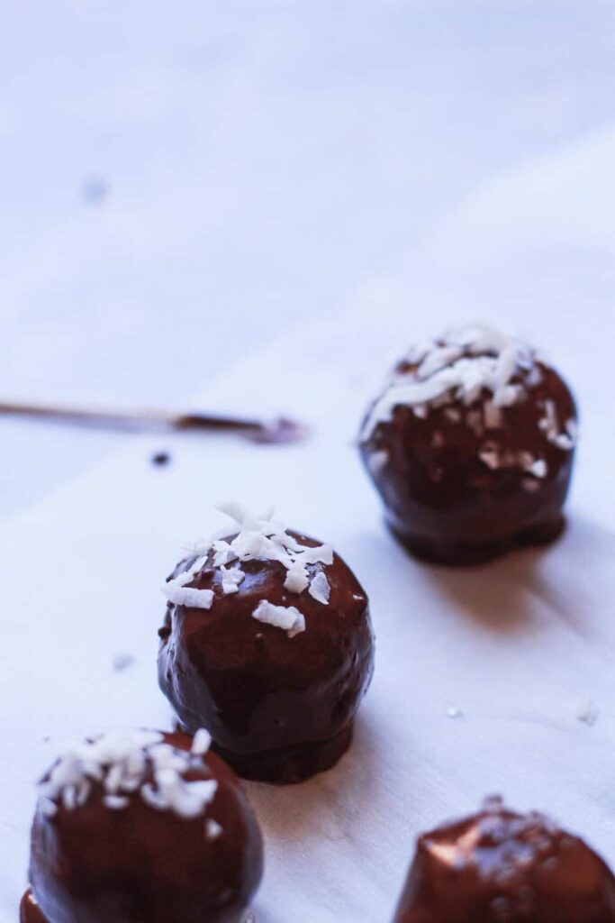 chocolate cooling on keto marzipan truffles