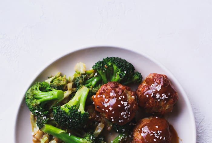 keto teriyaki chicken meatballs and broccoli on a plate