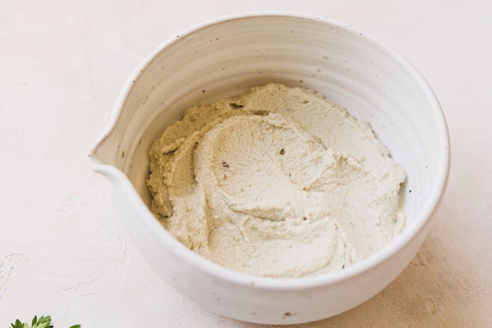 sunflower cashew ricotta in a mixing bowl