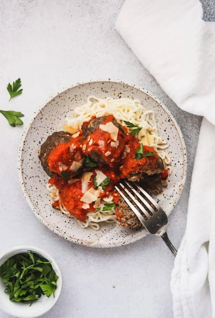 keto Italian meatballs on a plate with low-carb noodles