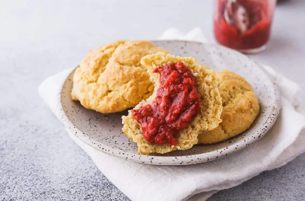 low-carb strawberry rhubarb chia jam on a biscuit