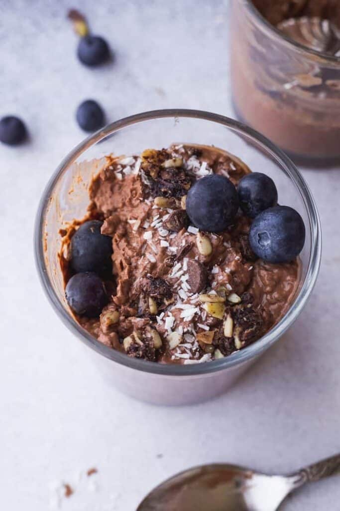 chocolate chia mousse with granola and blueberries