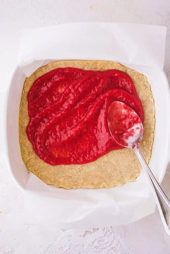 raspberry layer spread on crust