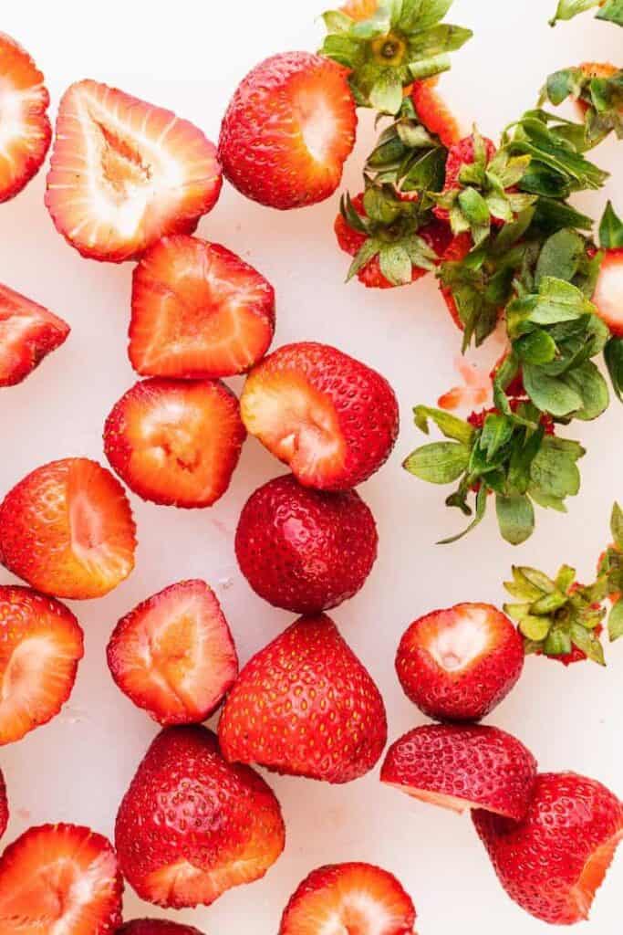 shot of cut strawberries for skinny margarita recipe