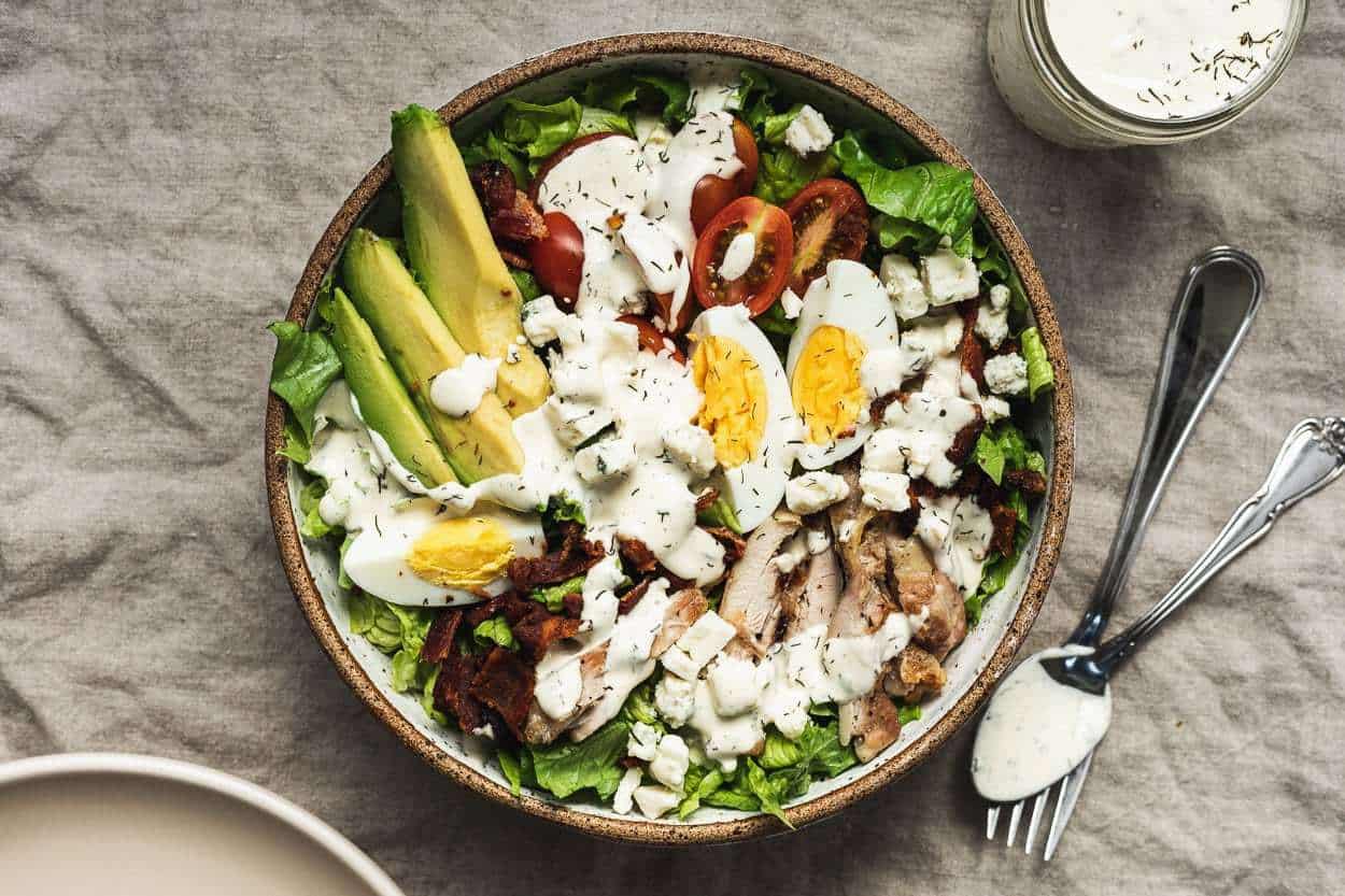 keto Cobb salad in a bowl with ranch dressing