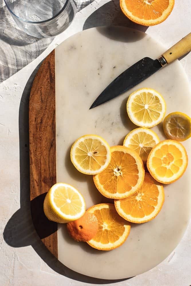 citrus on cutting board for red sangria recipe