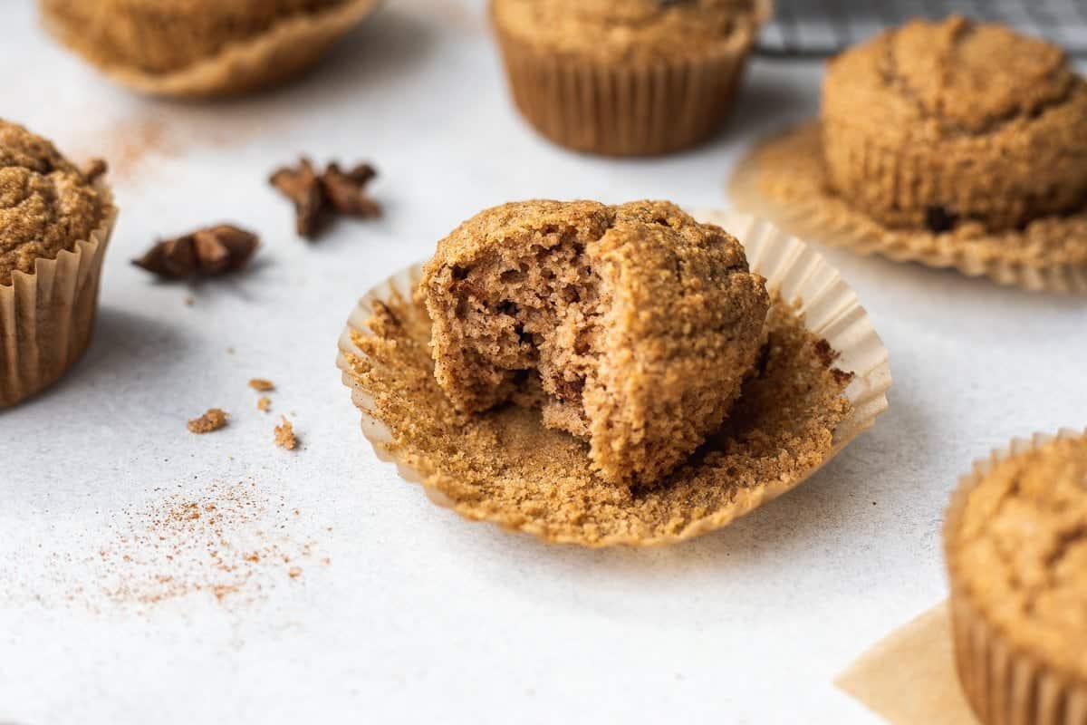 shot of a bite taken out of a keto cinnamon muffin