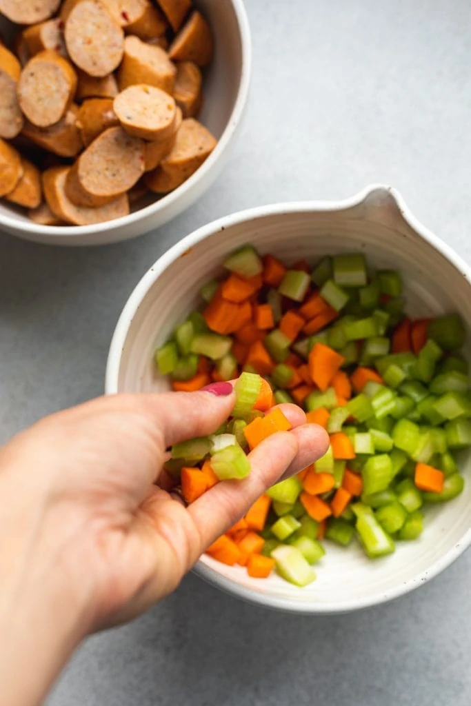 pouring veggies into bowl
