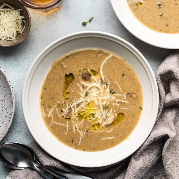 HERO image of keto soup recipe, mushroom soup in bowls with parmesan sprinkled on top