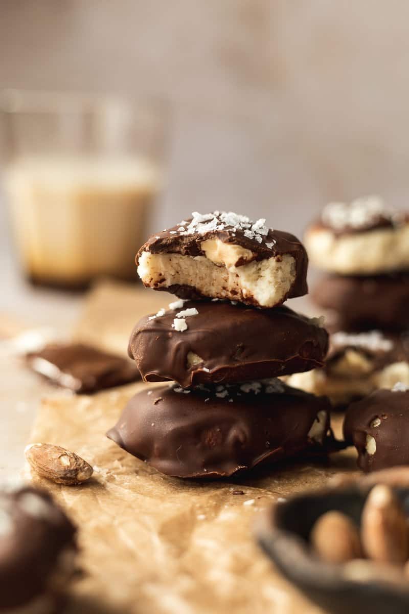 stacked keto almond joys on parchment paper