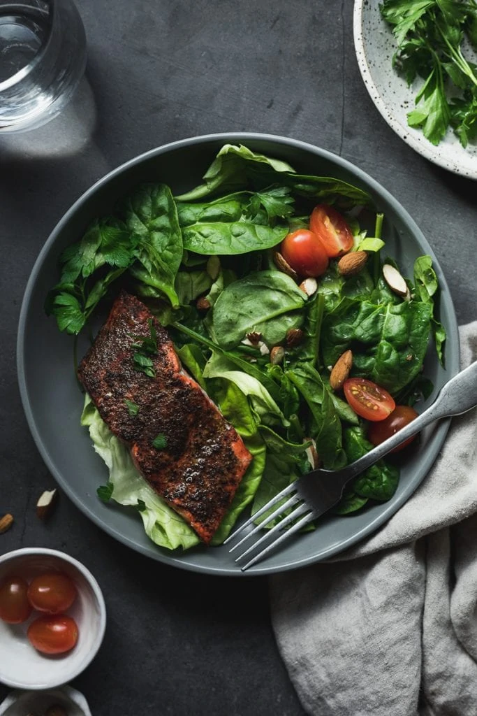 salad with air fryer salmon on the side