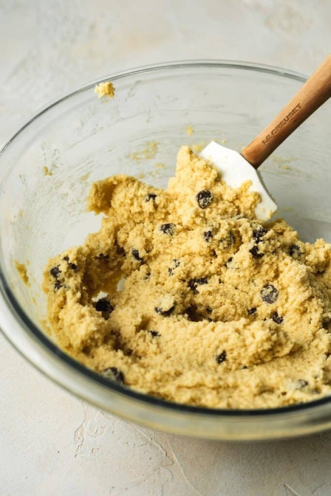 keto chocolate chip cookie dough in a bowl with a spatula