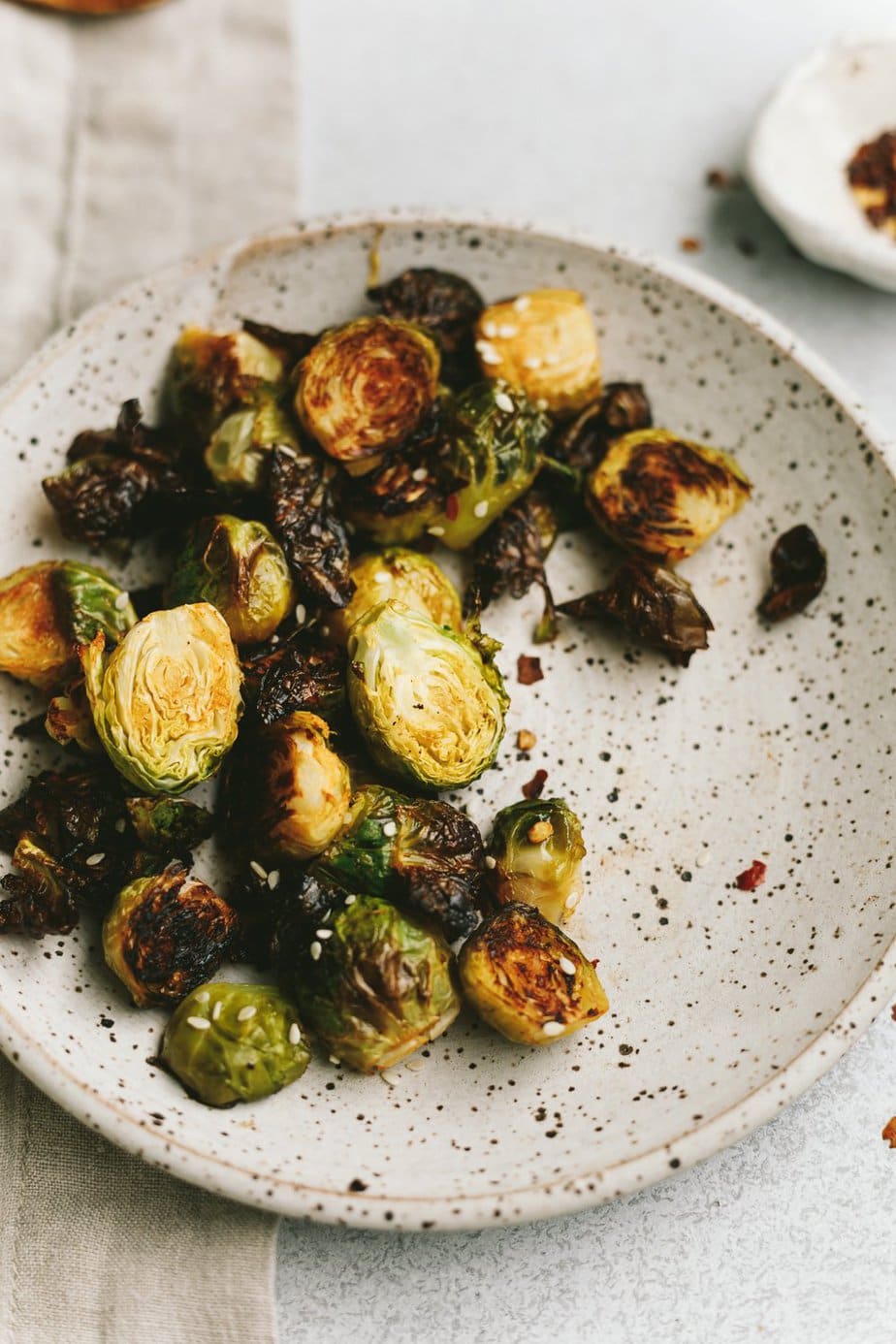 crispy sriracha Brussels sprouts on a plate