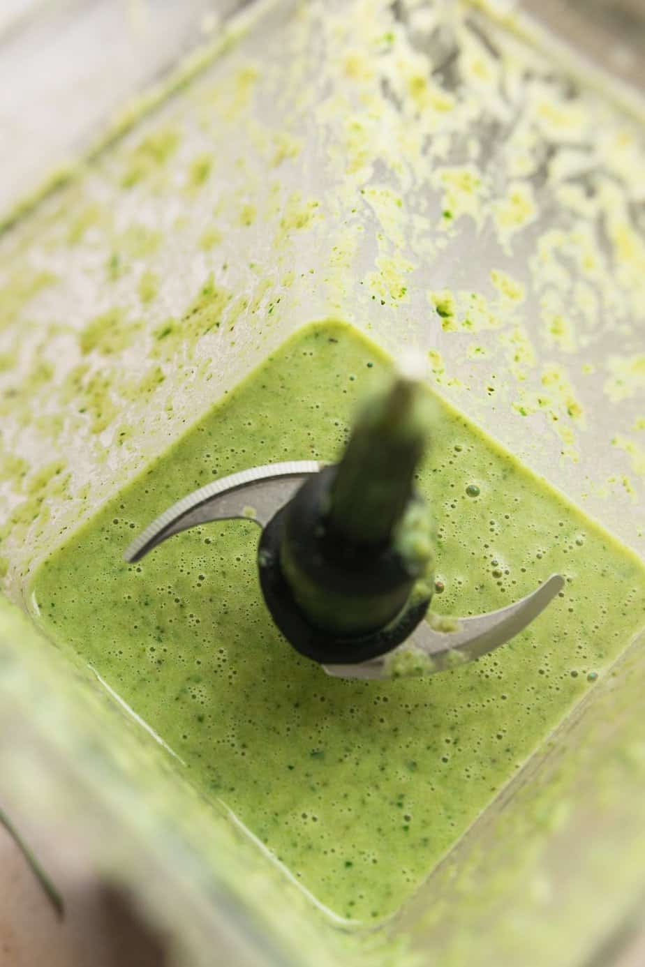 Blending jalapeño broccoli soup in a Vitamix blender. 