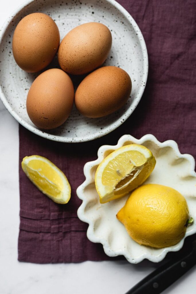 eggs and lemons in separate bowls