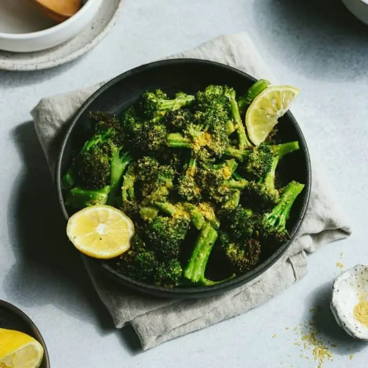 keto air fryer broccoli with lemon wedges