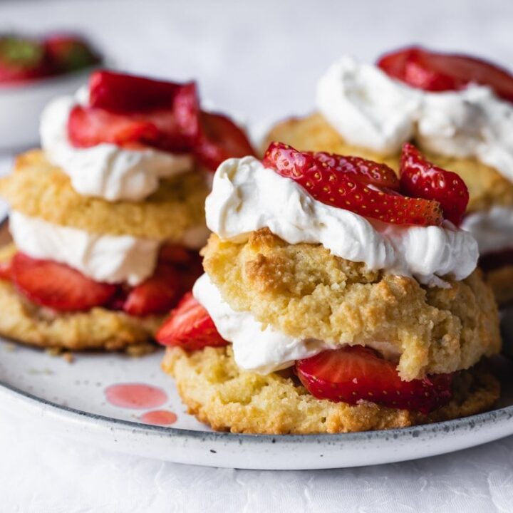 three low-carb strawberry shortcake on plate with spoon