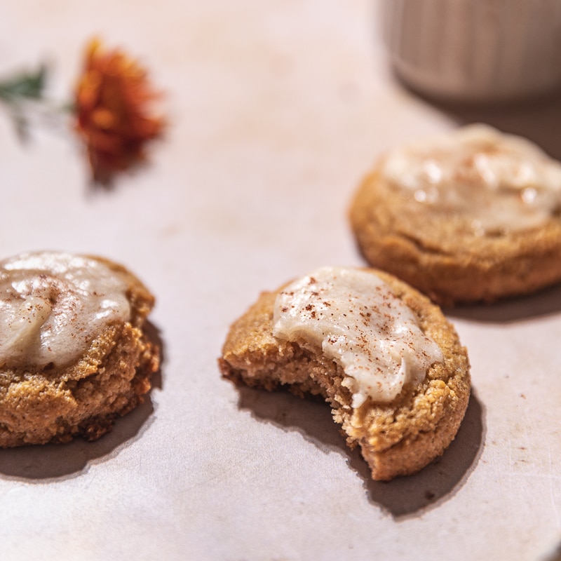 keto almond flour cookies with maple glaze on countertop