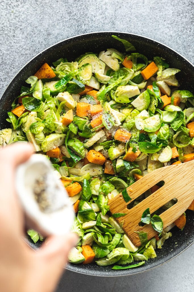 Brussels sprouts hash in a pan with seasonings