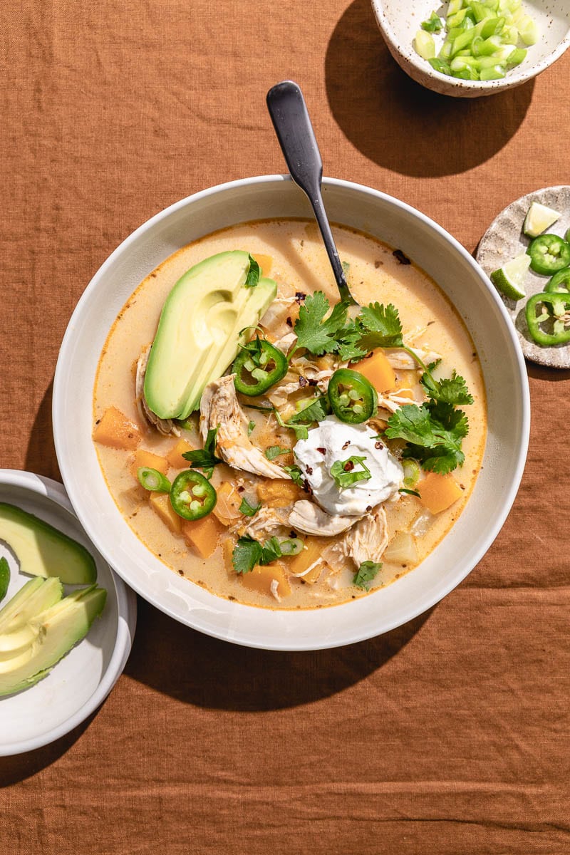 keto chicken chili in a bowl with a spoon