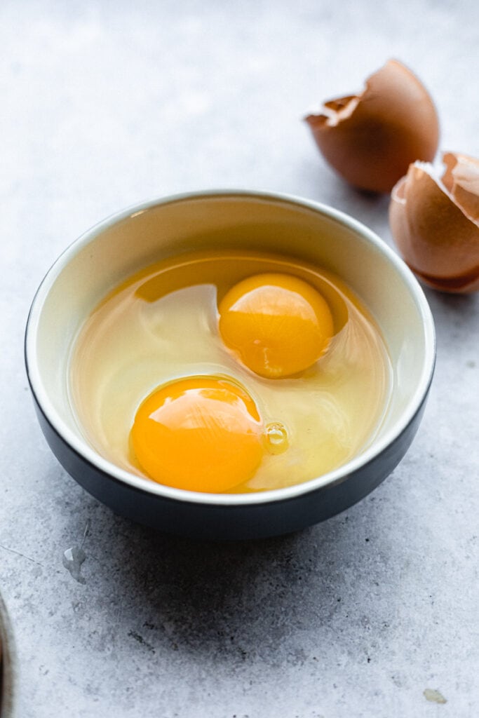 two eggs in a small ramekin