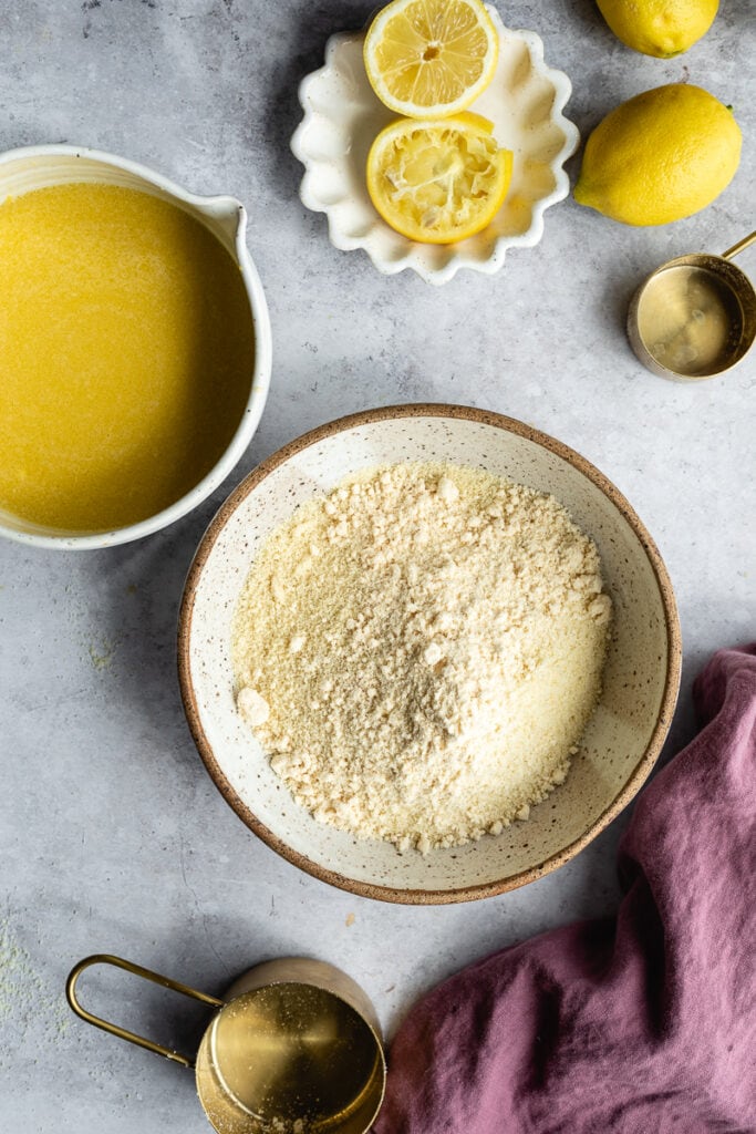 Bowl of almond flour and egg mixture for keto lemon loaf.