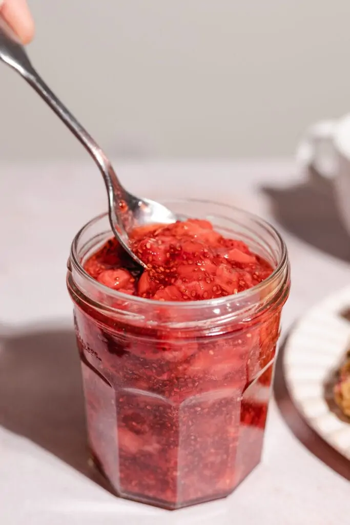 Closeup of a spoonful of keto jam.