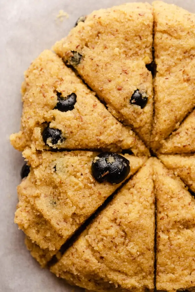 Overhead shot of triangular cuts in the dough.