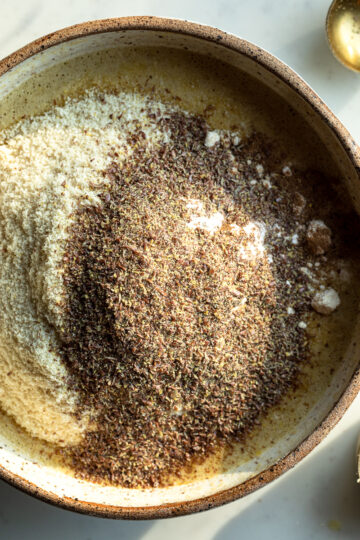 Closeup of dry ingredients in a bowl for almond flour banana muffins.