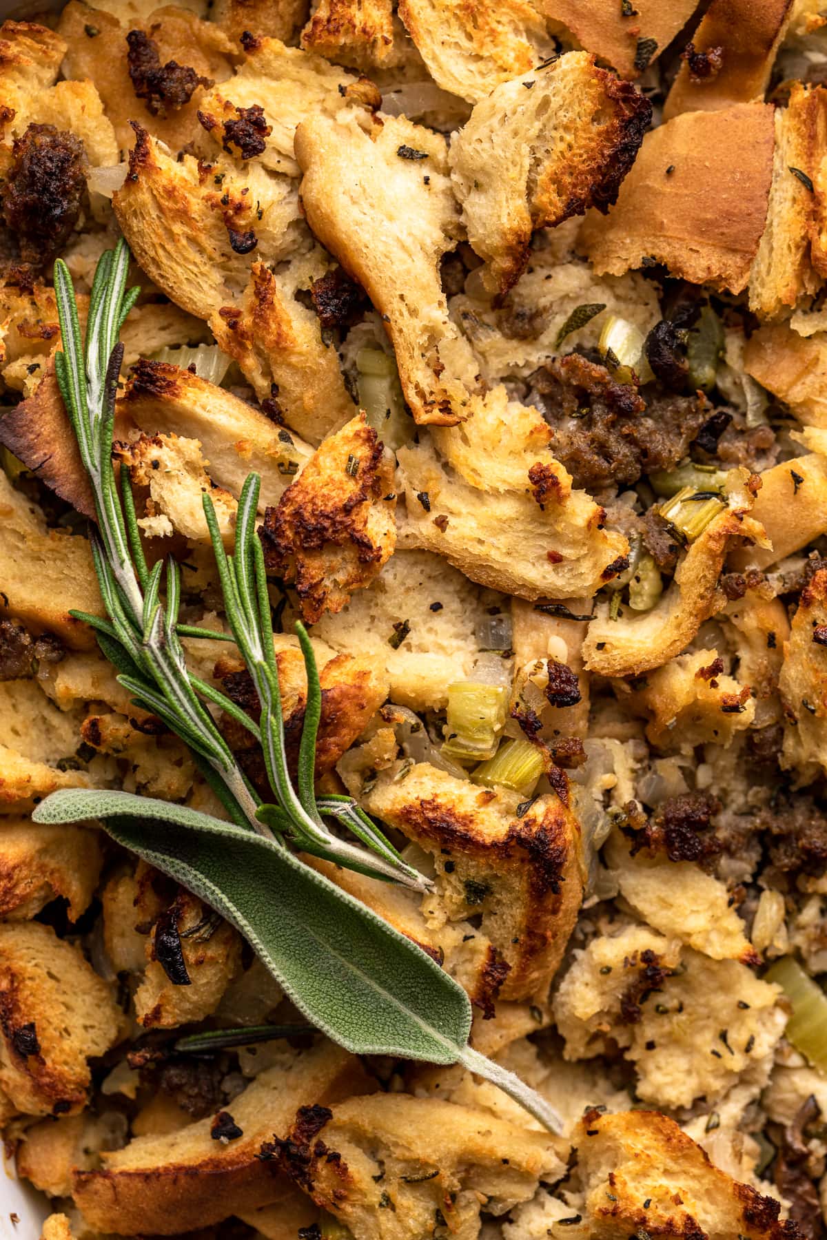 Closeup of toasted top of keto stuffing in a dish.