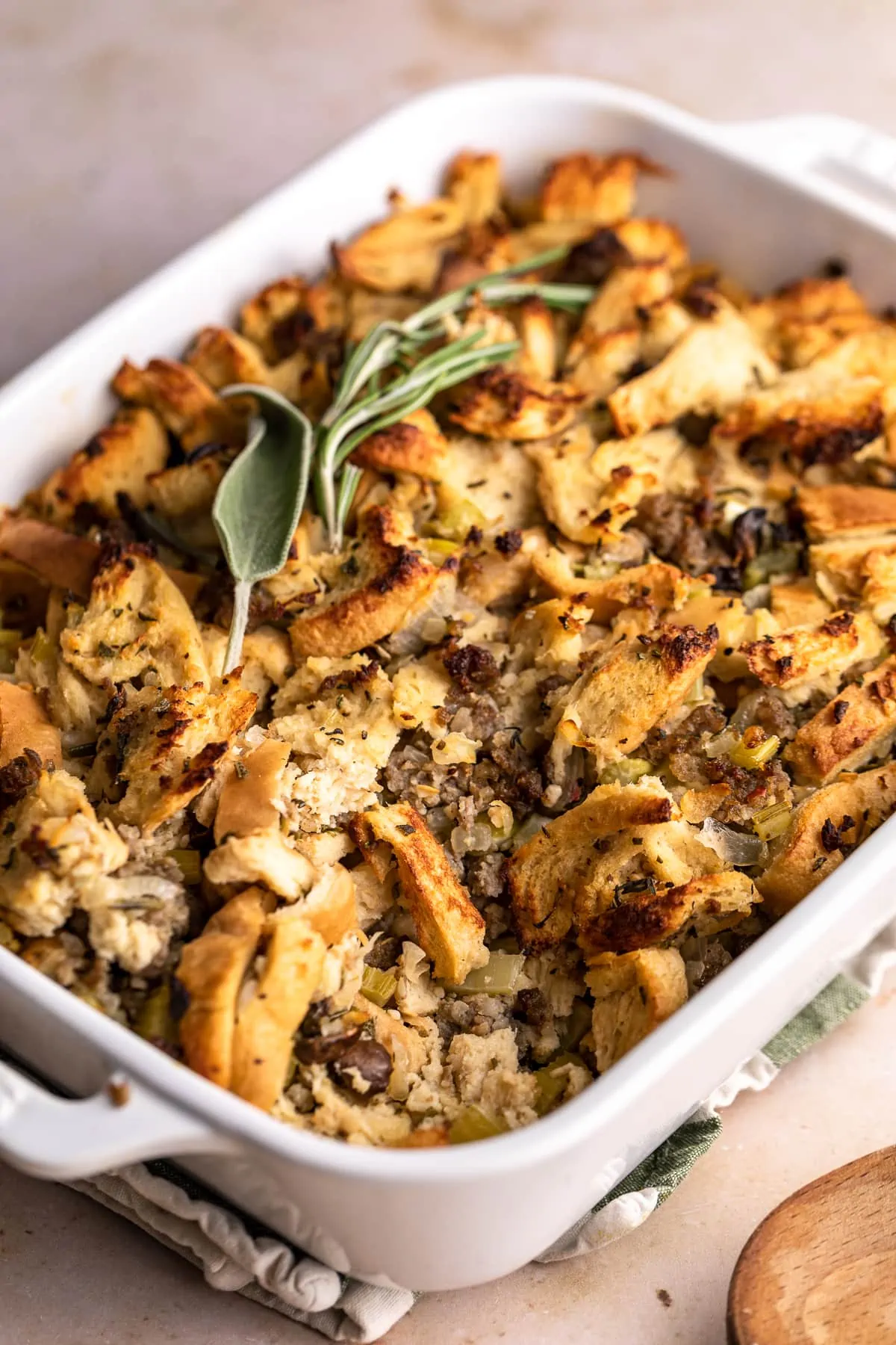 Baked keto stuffing in a white casserole dish.