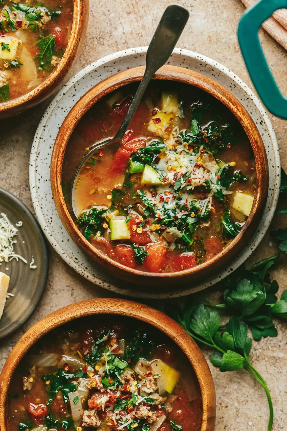 Closeup of bowls of keto Tuscan soup with beef and veggies.