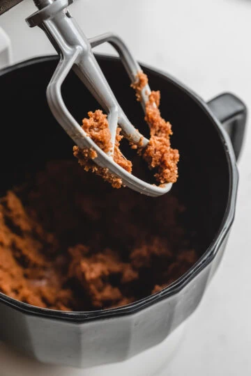 A mixer with keto almond butter cookie batter.