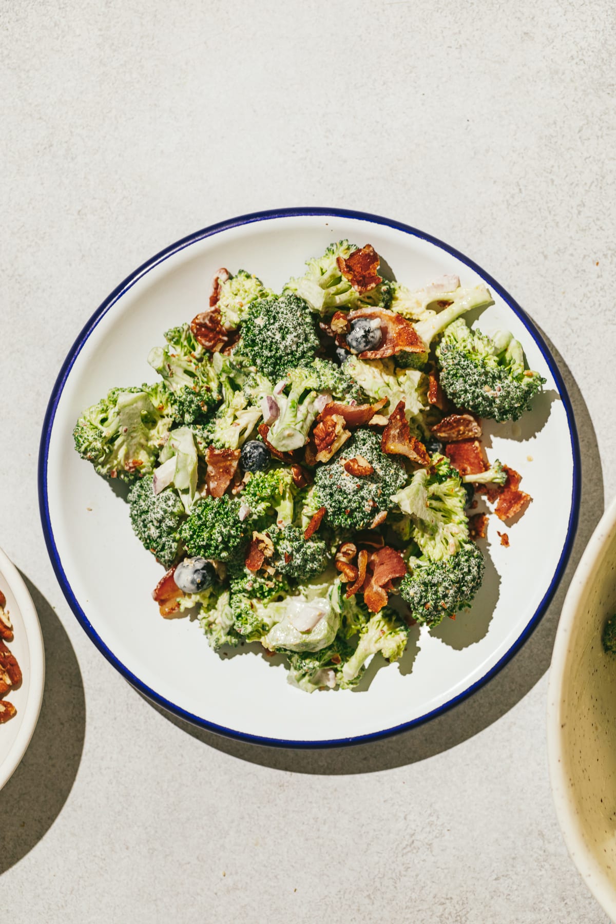 Broccoli crunch salad on a serving plate.