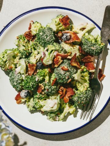 Broccoli crunch salad on a salad plate with a fork.