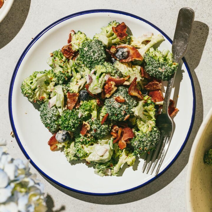 Broccoli crunch salad on a salad plate with a fork.
