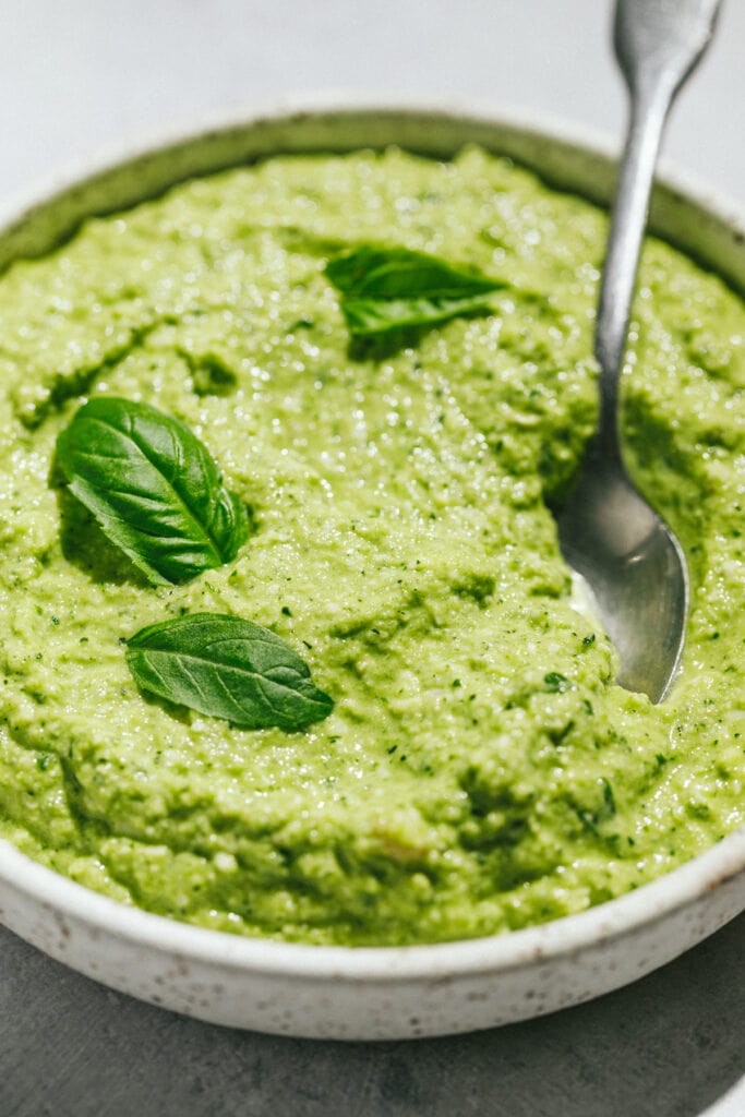 Zucchini pesto texture shown in a closeup.