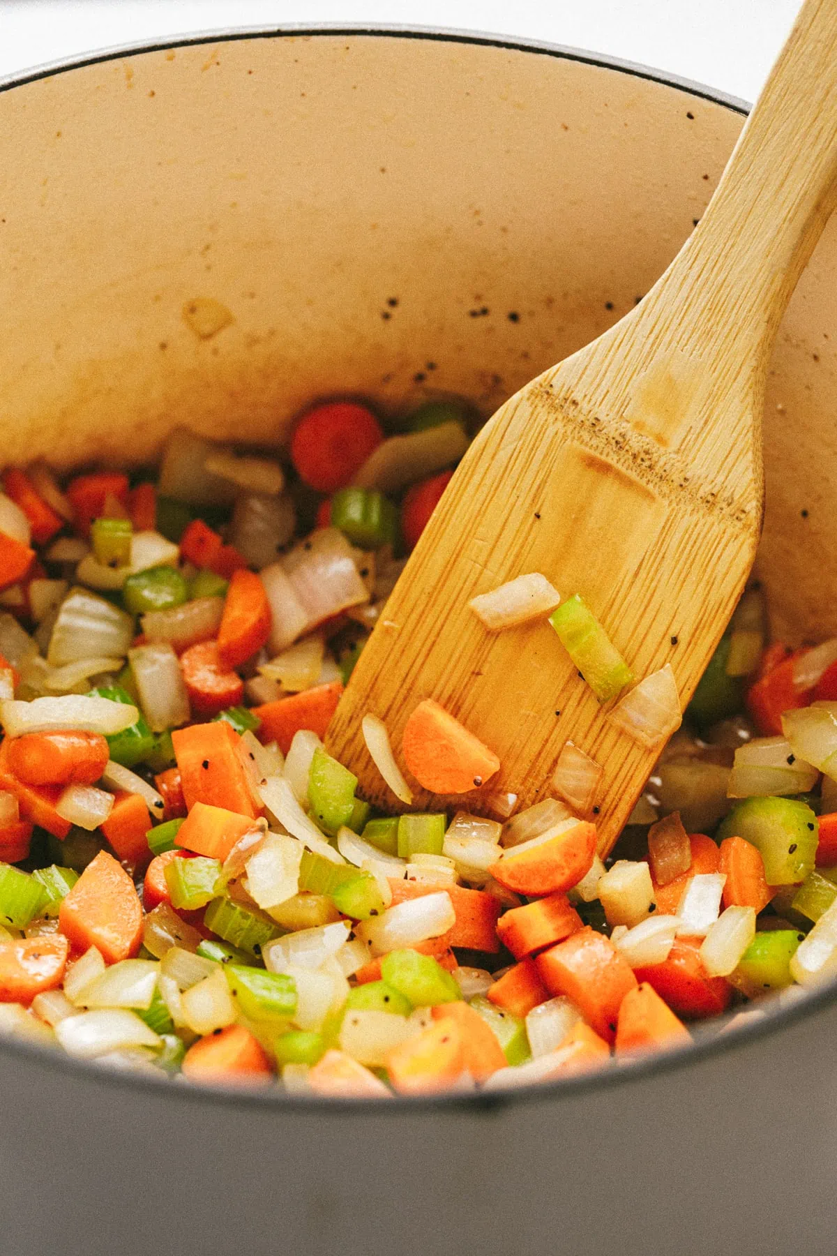 Vegetables in a Dutch oven for braised beef shanks recipe.