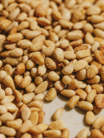 Toasted and seasoned pine nuts up close.