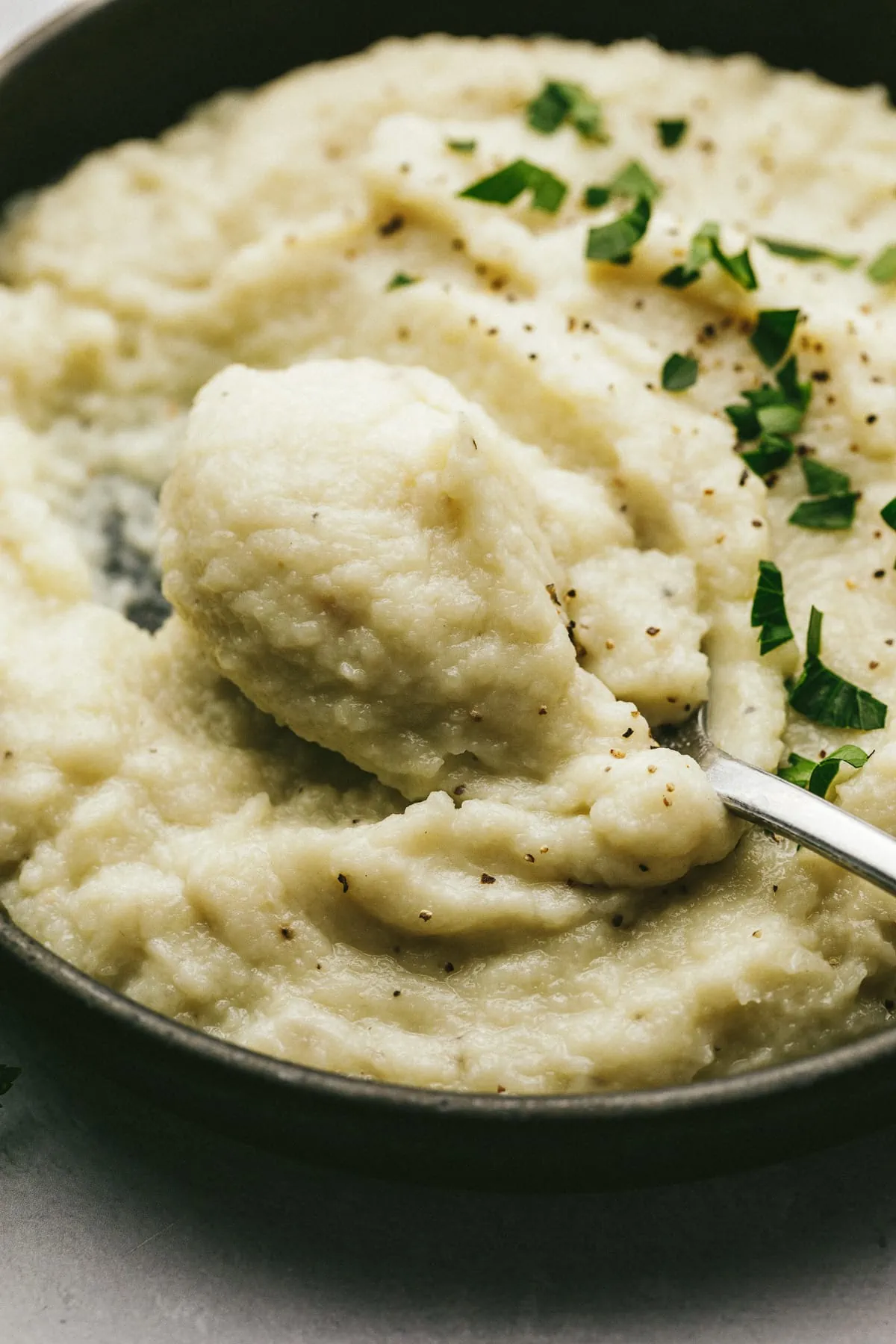 A spoonful of dairy-free and keto mashed cauliflower.