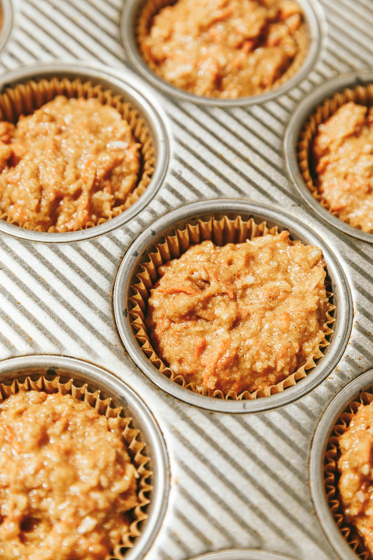Cupcake batter in muffin tin.
