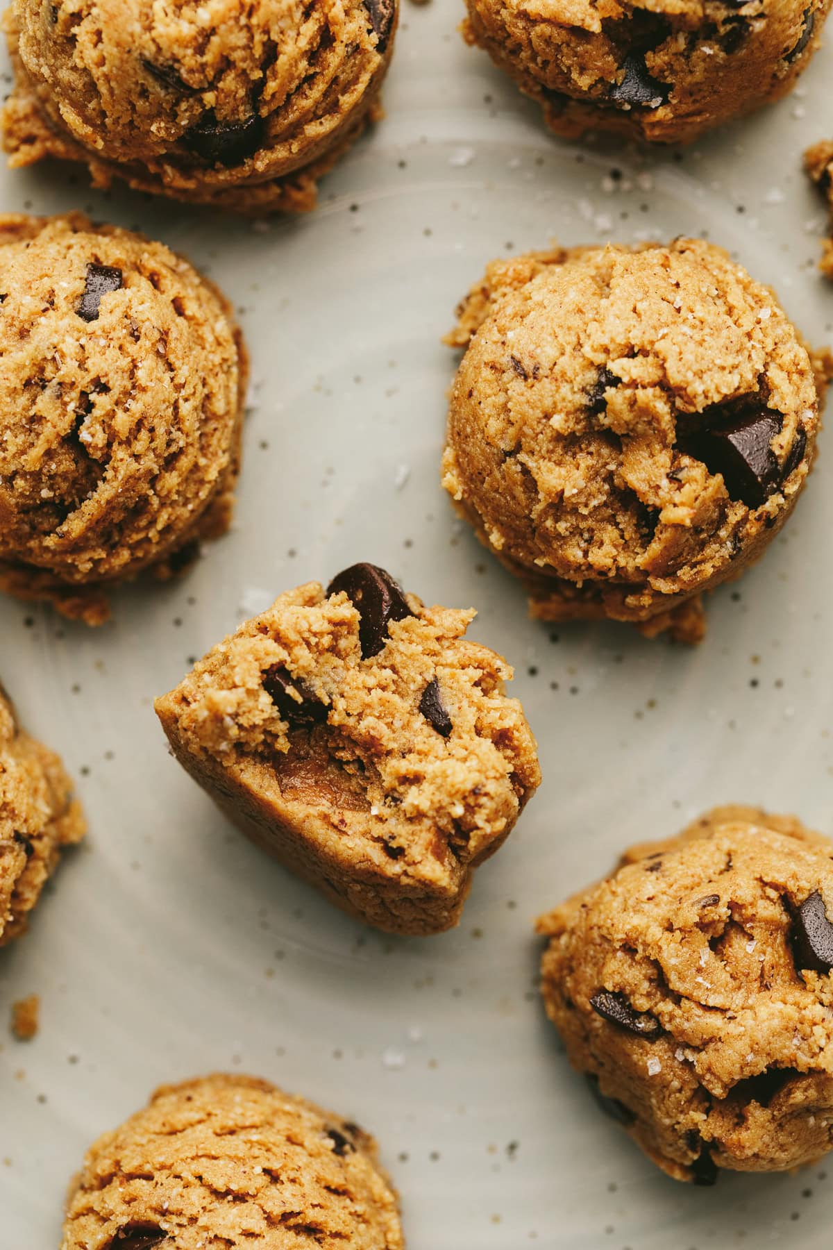Cookie dough protein bites on a plate.