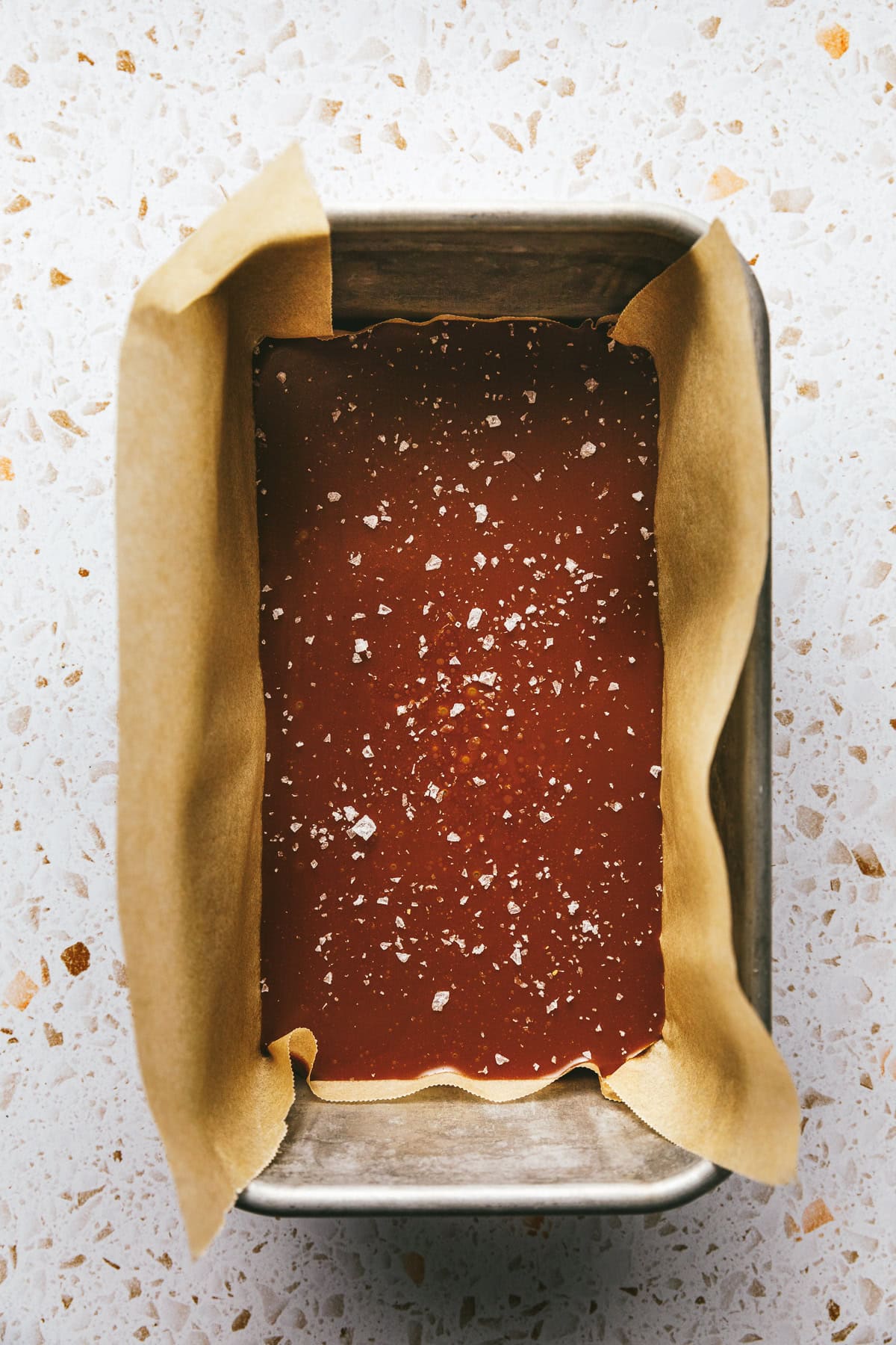 Keto caramel in a loaf pan to set.