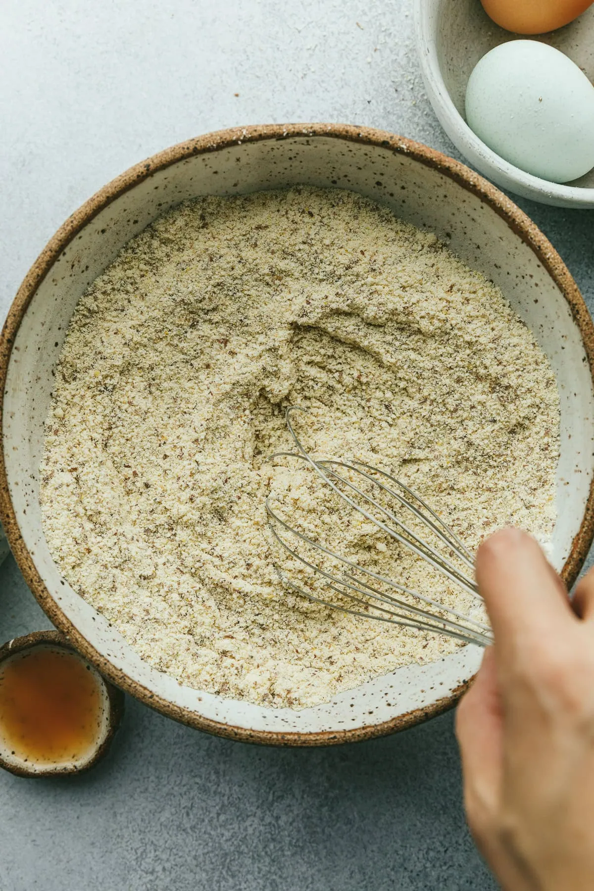 Mixing dry ingredients for high protein bread.