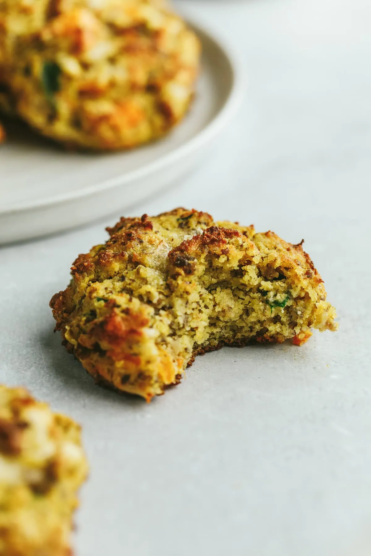 A high protein biscuit with a bite taken out of it.