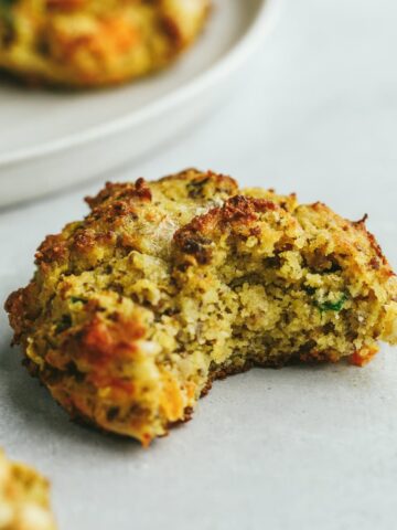 High protein breakfast biscuit with a bite taken out.
