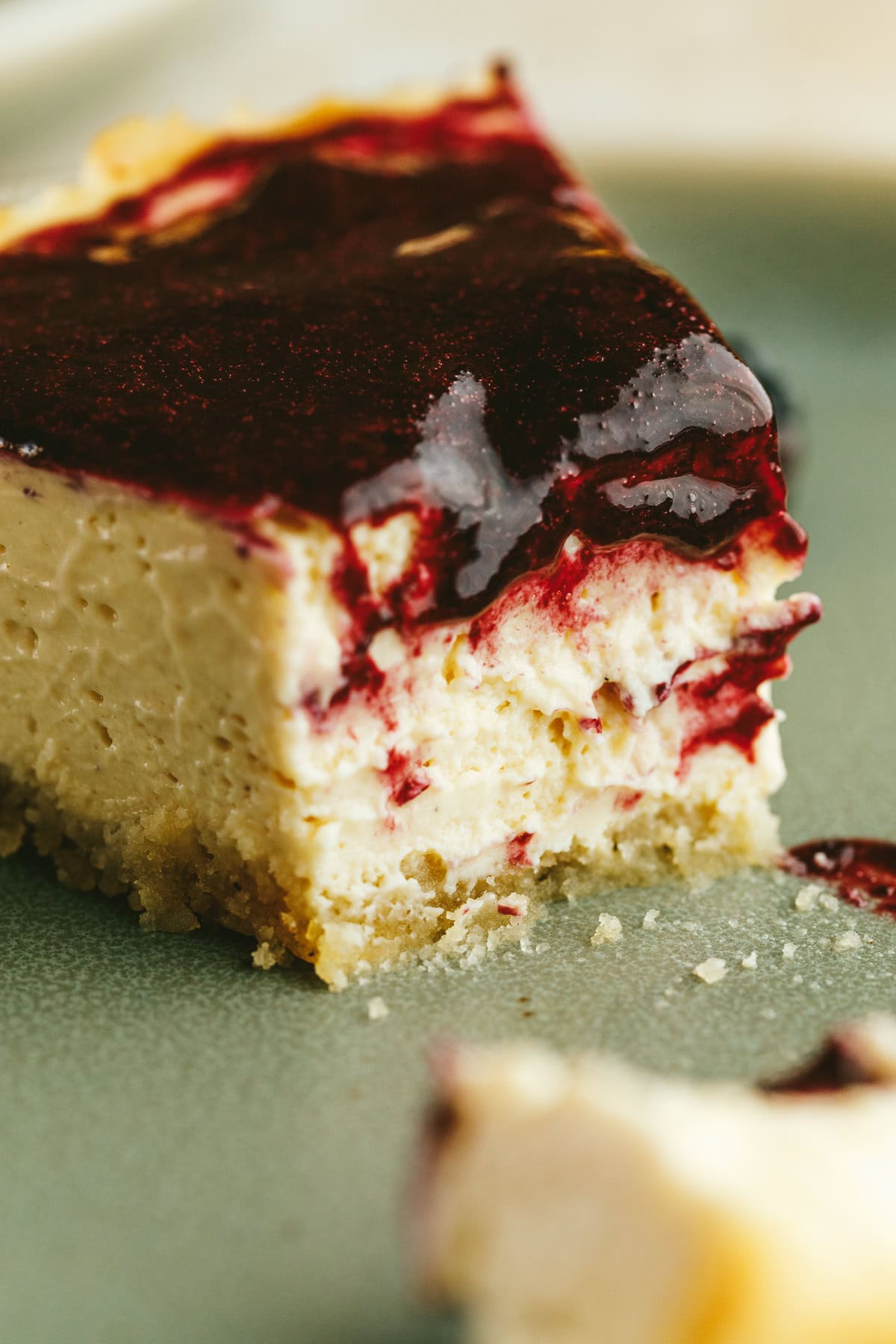 Closeup of the filling in a slice of high-protein cheesecake.