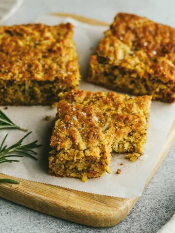 Three slices of rosemary parmesan bread.